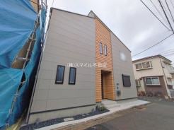 足立区本木西町