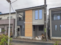 足立区本木西町