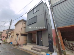 足立区本木西町